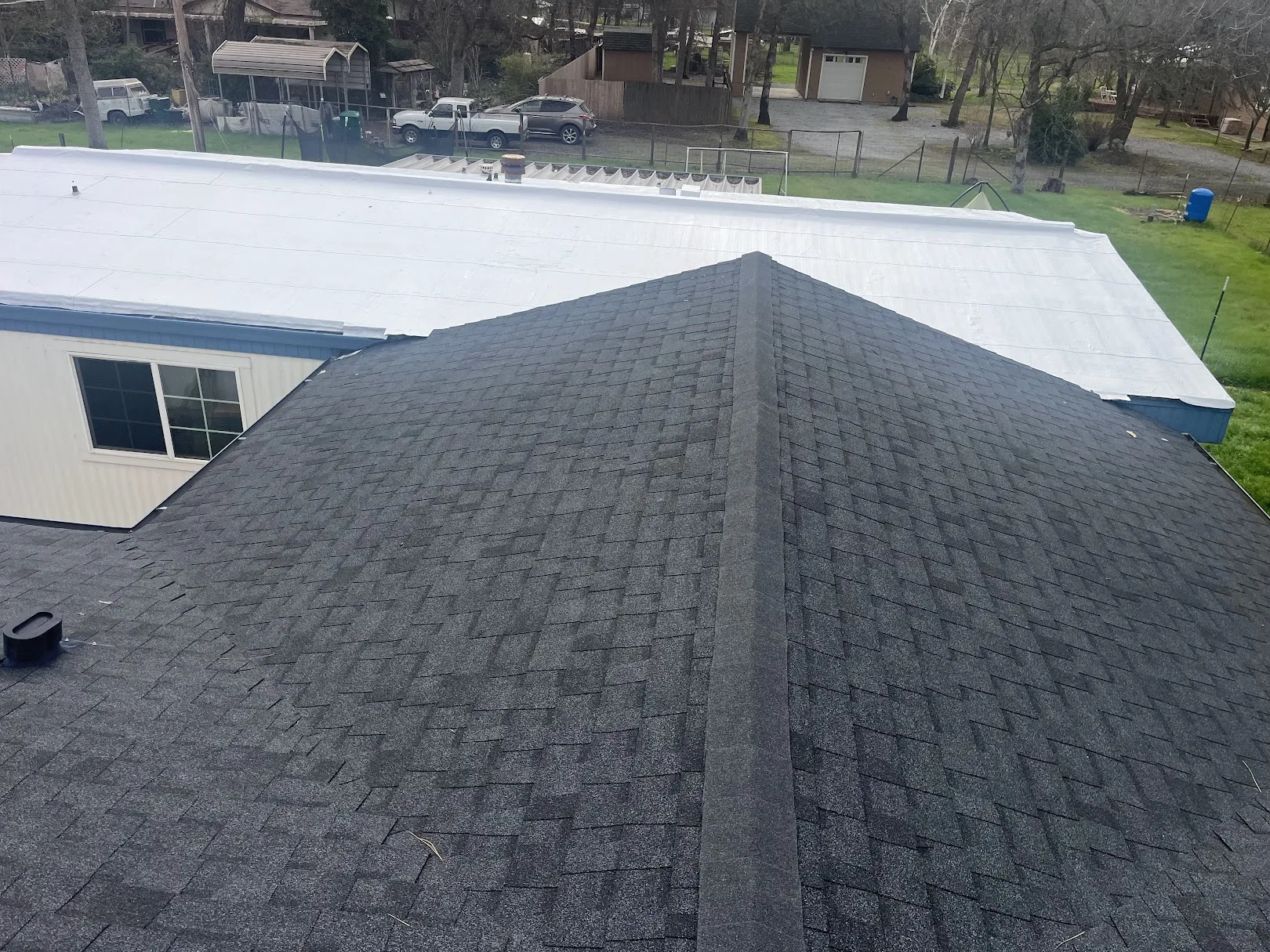 Completed asphalt shingle roof replacement